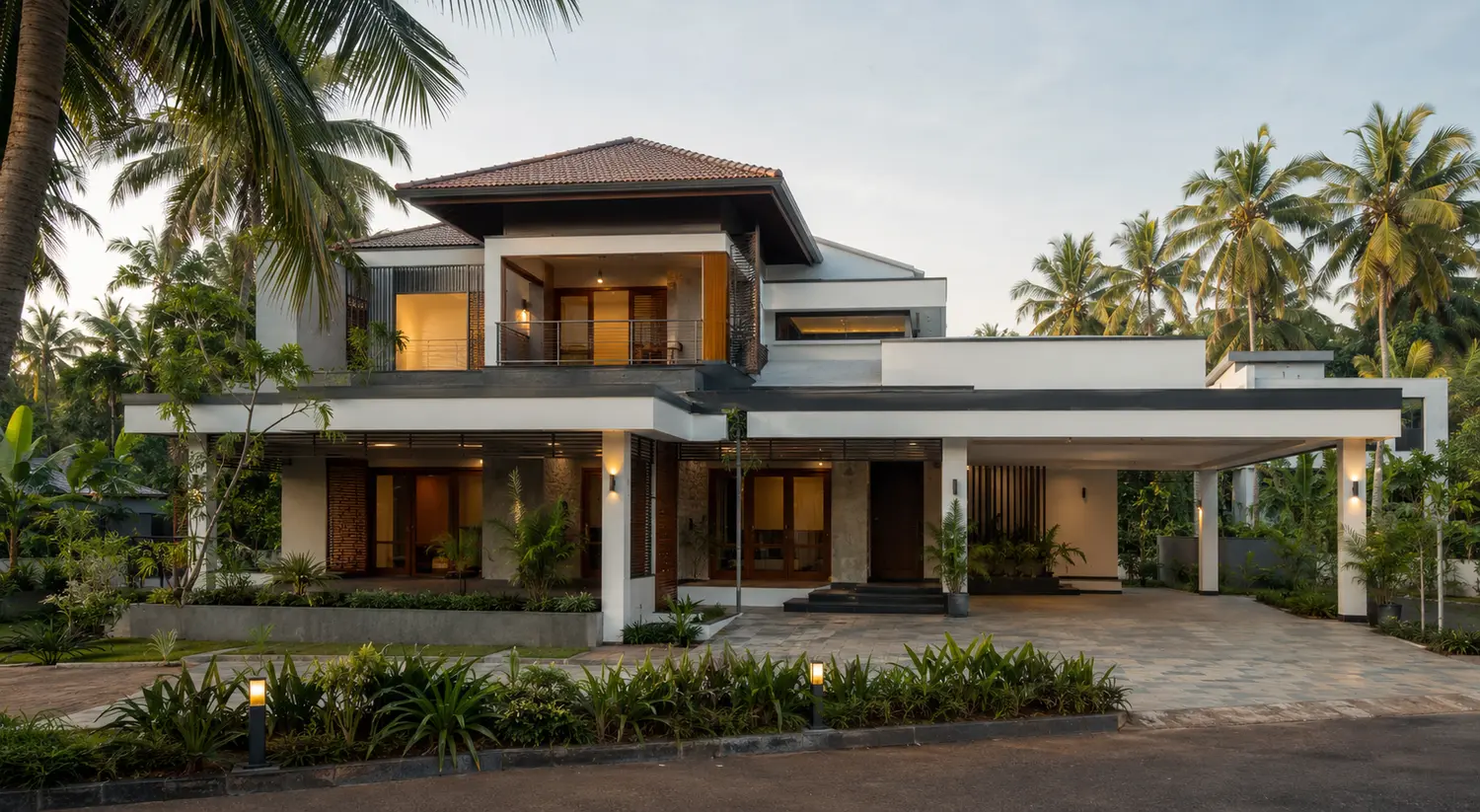 Modern Kerala house with tropical landscaping